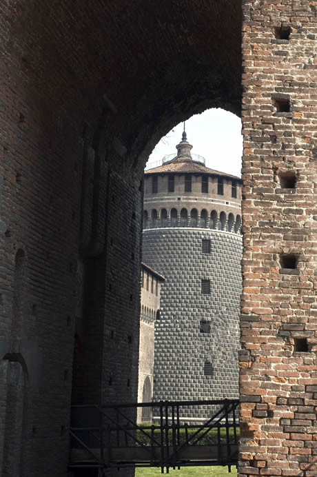 A tower of the ancient castle called castello sforzesco milan photo